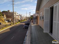 Prédio comercial com casa no bairro Ideal 
