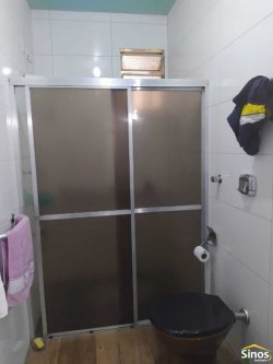 Prédio comercial com casa no bairro Ideal 