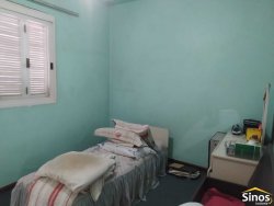 Prédio comercial com casa no bairro Ideal 
