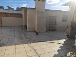 Prédio comercial com casa no bairro Ideal 