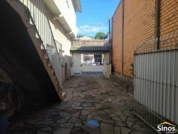 Prédio comercial com casa no bairro Ideal 