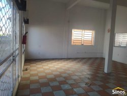 Prédio comercial com casa no bairro Ideal 