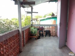 Casa de alvenaria com 02 dormitórios no bairro Rondônia  