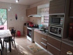 Casa de alvenaria com 02 dormitórios no bairro Rondônia  