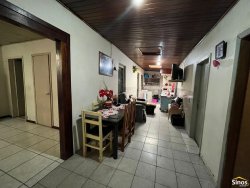 Terreno com casa no bairro Feitoria  