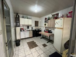 Terreno com casa no bairro Feitoria  