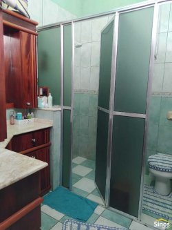 Terreno de 436,26m² com casa no bairro Rondônia  