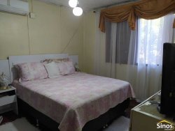 Terreno de 436,26m² com casa no bairro Rondônia  