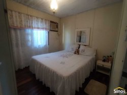 Terreno de 436,26m² com casa no bairro Rondônia  