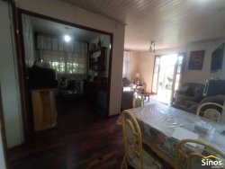 Terreno de 436,26m² com casa no bairro Rondônia  