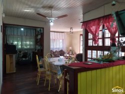 Terreno de 436,26m² com casa no bairro Rondônia  