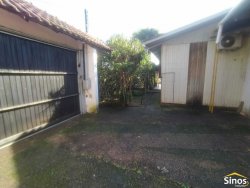 Terreno de 436,26m² com casa no bairro Rondônia  
