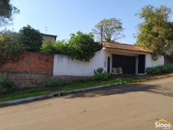 Terreno de 436,26m² com casa no bairro Rondônia  