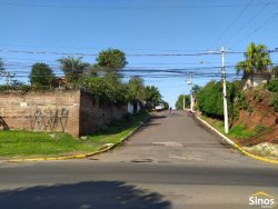 Terreno de 436,26m² com casa no bairro Rondônia  