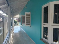 Casa com 03 dormitórios e prédio comercial no bairro Rondônia  