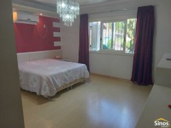 Casa com 03 dormitórios e prédio comercial no bairro Rondônia  