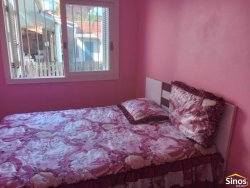 Casa com 03 dormitórios e prédio comercial no bairro Rondônia  