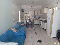 Casa com 03 dormitórios e prédio comercial no bairro Rondônia  