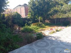 Casa com 03 dormitórios e prédio comercial no bairro Rondônia  