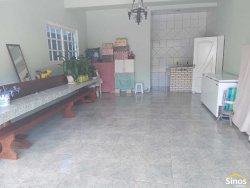 Casa com 03 dormitórios e prédio comercial no bairro Rondônia  