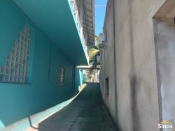 Casa com 03 dormitórios e prédio comercial no bairro Rondônia  