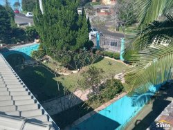 Casa com 03 dormitórios e prédio comercial no bairro Rondônia  