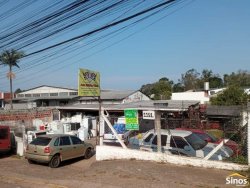 Terreno com construção no bairro Rondônia  