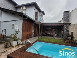 Terreno com 02 casas no bairro Ideal 