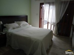 Terreno com 02 casas no bairro Ideal 