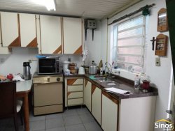 Terreno com 02 casas no bairro Ideal 