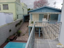 Terreno com 02 casas no bairro Ideal 