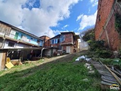 Terreno com casa no bairro Rondônia  
