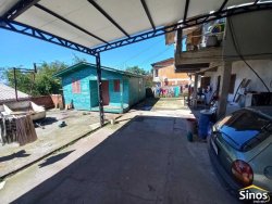 Terreno com 02 casas no bairro Rondônia  