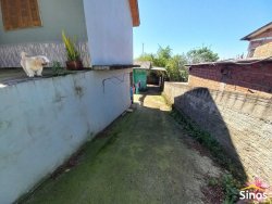 Terreno com 02 casas no bairro Rondônia  
