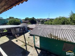 Terreno com 02 casas no bairro Rondônia  
