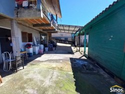 Terreno com 02 casas no bairro Rondônia  