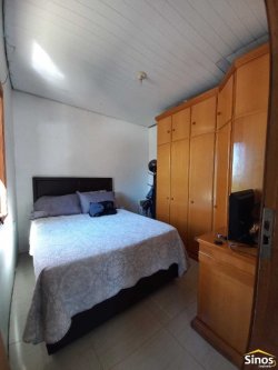 Terreno com 02 casas no bairro Rondônia  