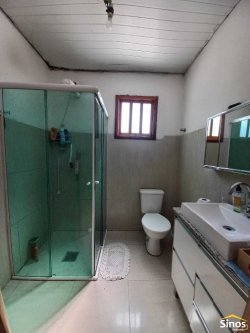 Terreno com 02 casas no bairro Rondônia  