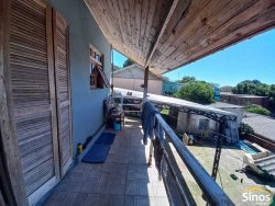 Terreno com 02 casas no bairro Rondônia  