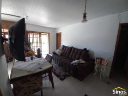 Terreno com 02 casas no bairro Rondônia  