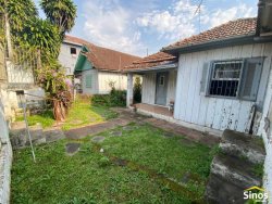 Terreno com construção no bairro Rondônia 