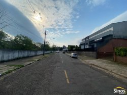 Terreno com construção no bairro Rondônia 
