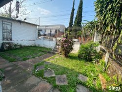 Terreno com construção no bairro Rondônia 