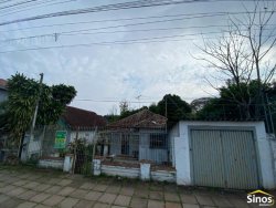 Terreno com construção no bairro Rondônia 