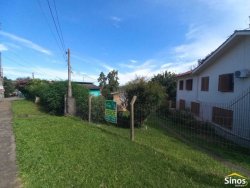 Terreno com construção no bairro Rondônia 