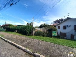 Terreno com construção no bairro Rondônia 