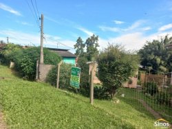 Terreno com construção no bairro Rondônia 