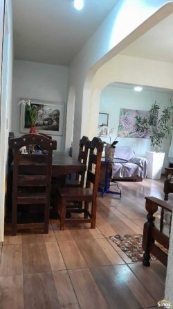 Terreno com pavilhão e sobrado no bairro Lomba Grande 