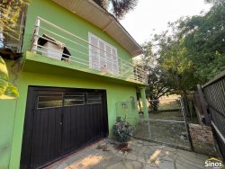 Terreno com pavilhão e sobrado no bairro Lomba Grande 
