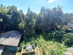 Terreno com construção no bairro Vila Nova 